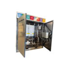 internal components of 300kW boiler hire unit showing pipework, heating system, and controls
